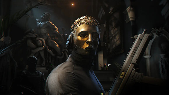 A person in a dark setting wearing a gold mask and headset, holding a weapon near classical statues.