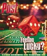Two red dice on a green felt casino table with stacks of chips in the background. Text reads 'Feeling Lucky?'