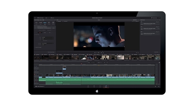 A laptop screen showing a professional video editing interface with a timeline and a video preview.