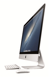 A silver Apple iMac computer with a keyboard and mouse on a white background.