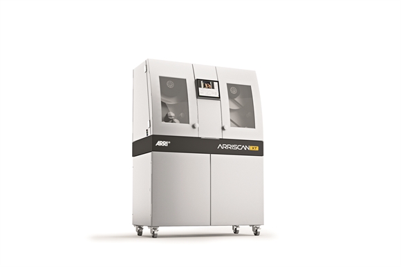 A large, white ARRISCAN XT film scanning machine with two viewing windows and a central digital display.