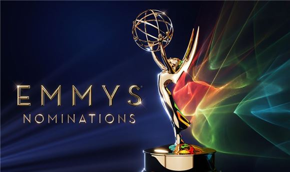 Gold Emmy Award trophy against a dark blue background with colorful light streaks and text reading EMMYS NOMINATIONS.