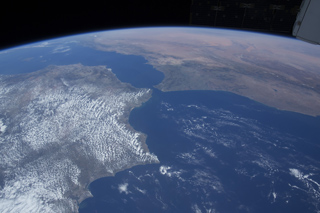 Aerial view of the Strait of Gibraltar connecting the Atlantic Ocean and the Mediterranean Sea.