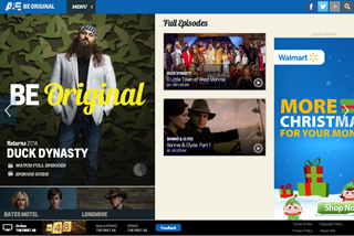 A&E streaming interface displaying Duck Dynasty, Bonnie & Clyde, and a Walmart advertisement.