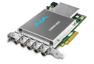 AJA Corvid HEVC PCIe expansion card with a silver heatsink and five BNC connectors on a green circuit board.
