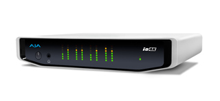 A white AJA io4K device with a black front panel featuring green and orange LED indicator lights.