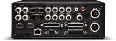 Rear view of a black electronic device featuring SDI, HDMI, XLR, and fiber optic ports.