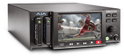A black AJA Ki Pro Ultra media recorder with a screen showing an American football player in action.