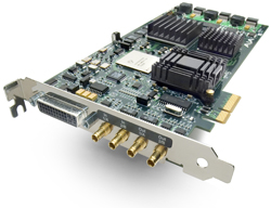 A green printed circuit board with black heat sinks and four gold-colored coaxial connectors on a metal bracket.
