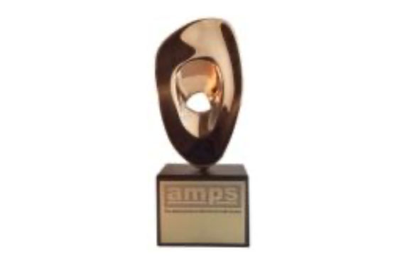 A gold-colored, abstract teardrop-shaped trophy on a black rectangular base with an AMPS logo.