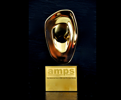 A gold, organic-shaped trophy mounted on a black rectangular base with the AMPS logo.