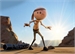 A thin, cartoonish character stands in a desert under a bright sun between rocky cliffs.