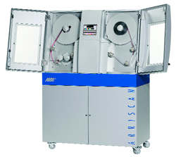 A large silver and blue Arriscan film scanning machine with two large reels and open protective doors.