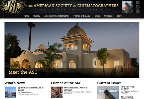 Website homepage for The American Society of Cinematographers featuring a large building at dusk.