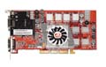 A red printed circuit board graphics card with a small black cooling fan in the center.