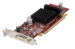 A red printed circuit board with a large black heatsink and a silver metal output port.