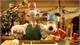 Animated white dinosaur wearing a green vest and orange shirt, holding a small blue container in a decorated room.