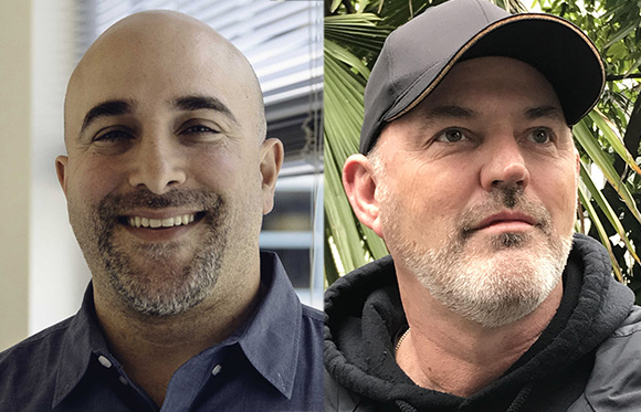 Side-by-side portraits of a smiling bald man in a blue shirt and a man with a grey beard wearing a baseball cap.