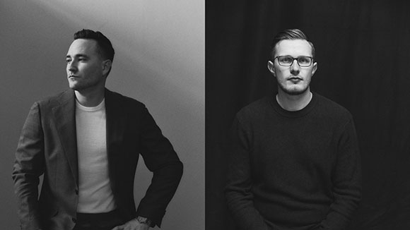 Two black and white portraits: one man in a blazer looking away, another in a sweater looking forward.