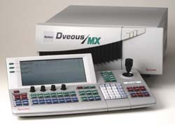 A white Dveous/MX control console with a screen and buttons in front of a large white electronic unit.