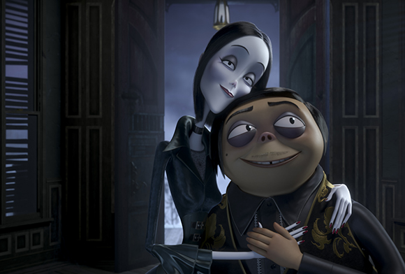 An animated pale woman with long black hair embraces a stout man in a black suit.