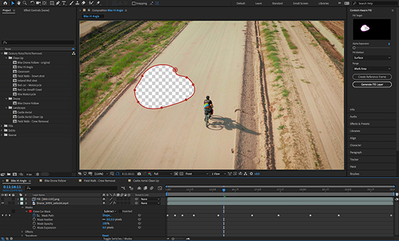 Video editing software interface with a red mask outline on a dirt path being used to isolate an area.