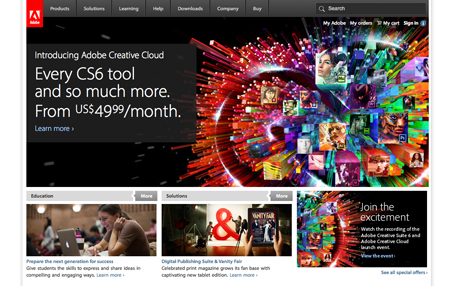 Adobe website banner promoting Creative Cloud with colorful abstract graphics and software icons.