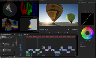 A complex video editing software interface showing a timeline, color wheels, and a hot air balloon video.