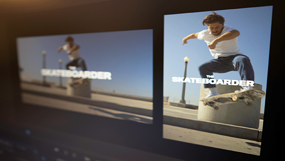 A skateboarder in mid-air over a concrete obstacle with the words "The Skateboarder" on the screen.