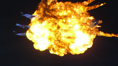 A massive, bright orange and yellow fireball exploding against a black background.