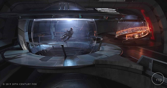 A person floats weightlessly inside a large, transparent spherical chamber within a dark, high-tech facility.