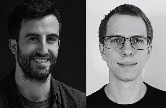 Two black and white headshots of men, one with a beard against a dark background and one with glasses.