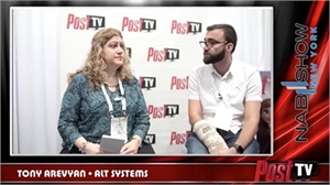 A woman in a patterned teal shirt and a man in a white shirt sit talking in front of a Post TV logo wall.