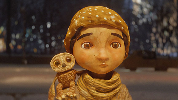 A claymation-style child with large eyes wearing a patterned hat and scarf, with a small owl on their shoulder.