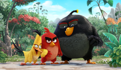 Three stylized animated birds, one large black, one medium red, and one small yellow, in a jungle.