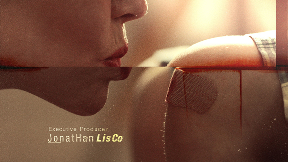 Close-up profile of a person's face and lips reflected in water with text at the bottom.