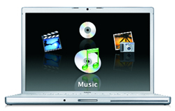 A laptop screen showing icons for movies, music, and photography against a black background.