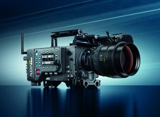 A professional cinema camera with a large lens and various control buttons on a dark blue background.
