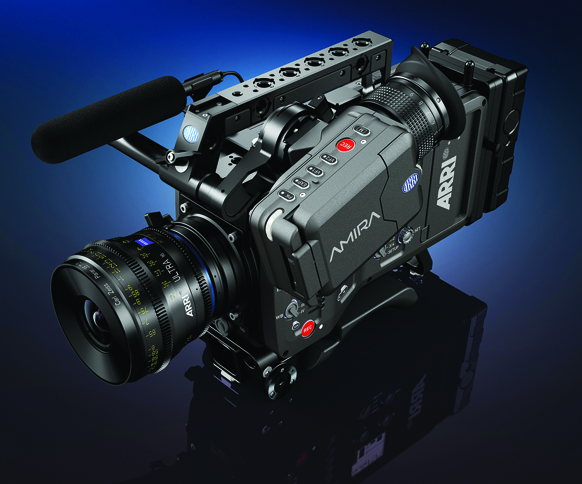 A black ARRI Amira digital cinema camera with a large lens and top handle against a blue background.