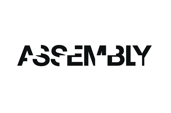The word ASSEMBLY in a bold, black, stylized typeface on a white background.
