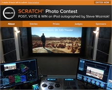 A computer monitor shows an advertisement for a Scratch Photo Contest with an iPad prize.