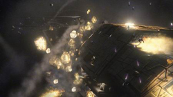 A massive dark spacecraft drifting through space amidst glowing golden debris and cosmic dust.