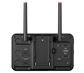 Rear view of a black electronic device featuring two long antennas and various ports.