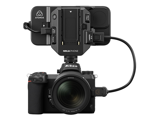 A Nikon Z7 camera connected via HDMI cable to an Atomos Ninja Phone rig mounted on top.