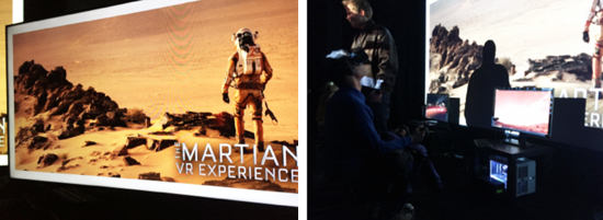 A large screen shows a VR experience with an astronaut on Mars. In the foreground, people wear VR headsets.
