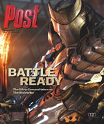 A character in detailed silver armor, with a glowing orange light source to the left, stands in a battle-ready pose.