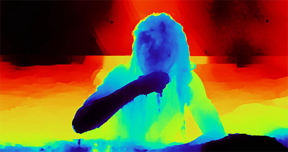 Thermal color map of a person's silhouette against a red and orange background.