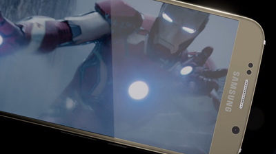 A gold Samsung smartphone displaying a close-up of the superhero Iron Man on its screen.