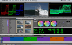 A computer screen showing a complex video editing software interface with various color graphs and video thumbnails.