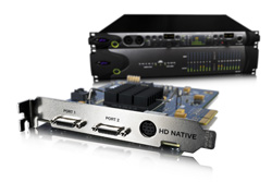 A computer expansion card labeled HD Native in front of two black rack-mounted server units.